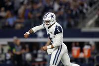 Dallas Cowboys quarterback Dak Prescott (4) celebrates a touchdown during an NFL football game against the Philadelphia Eagles, Sunday, Dec. 10, 2023, in Arlington, Texas. (AP Photo/Matt Patterson)