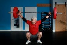 Retired litigator and competitive weightlifter Laurie Armstrong, 75, works on his clean and jerk using technique plates while at CrossFit Vic City in Victoria, B.C., on Sunday, December 11, 2022. Chad Hipolito/The Globe and Mail 