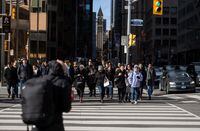 While the rush hour crowds were lower in downtown Toronto, presumably because of the coronavirus pandemic, it was still crowded outside Union Station at 4:30 pm on Friday afternoon. March 13, 2020 (Melissa Tait / The Globe and Mail) 