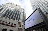 FILE PHOTO: The Refinitiv logo is seen on a large screen in Canary Wharf in London, Britain August 1, 2019. REUTERS/Toby Melville/File Photo
