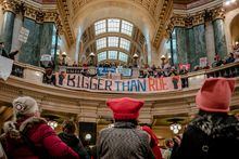 Demonstrators gather for a Bigger Than Roe rally after participating in a womenÕs march for abortion rights, at the Wisconsin State Capitol in Madison on Sunday, Jan. 22, 2023. (Jamie Kelter Davis/The New York Times)