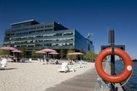 The Corus building sits nest to Sugar Beach on the Toronto waterfront. The Vanguard FTSE All World ex-US Small-Cap ETF is 13 per cent invested in Canadian companies, such as H&R REIT, which owns the Corus building.