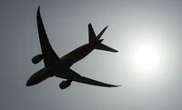 A plane is silhouetted as it takes off from Vancouver International Airport in Richmond, B.C., Monday, May 13, 2019. Trip cancellation insurance covers you or other passengers in your family who are ill and can't fly, as well as a variety of other unlikely-but-expensive possibilities. THE CANADIAN PRESS/Jonathan Hayward