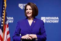 LAS VEGAS, NEVADA - NOVEMBER 08: U.S. Sen. Catherine Cortez Masto (D-NV) listens as Nevada Gov. Steve Sisolak delivers remarks at an election night party hosted by Nevada Democratic Victory at The Encore on November 08, 2022 in Las Vegas, Nevada. Sen. Catherine Cortez Masto (D-NV) is facing Republican challenger Adam Laxalt, while Gov. Steve Sisolak is facing Republican Joe Lombardo. (Photo by Anna Moneymaker/Getty Images)
