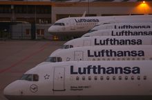 FILE PHOTO: Planes of German air carrier Lufthansa are parked as Lufthansa pilots start a strike over a wage dispute, at the airport in Frankfurt, Germany September 2, 2022.  REUTERS/Kai Pfaffenbach/File Photo