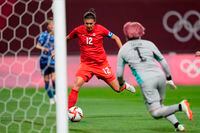 Canada's Christine Sinclair scores a goal against Japan during a match at the Tokyo Olympics, on July 21.