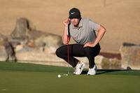 Davis Thompson measures his putt on the 17th hole during the American Express golf tournament on the Pete Dye Stadium Course at PGA West Saturday, Jan. 21, 2023, in La Quinta, Calif. (AP Photo/Mark J. Terrill)