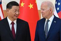 (FILES) US President Joe Biden (R) and China's President Xi Jinping (L) meet on the sidelines of the G20 Summit in Nusa Dua on the Indonesian resort island of Bali on November 14, 2022. China's top diplomat will pay a rare visit to Washington this week, the United States announced October 23, 2023, paving the way for a potential visit by President Xi Jinping aimed at keeping tensions in check. Foreign Minister Wang Yi, the highest-ranking Chinese official in the US capital in nearly five years, will visit from October 26 through October 28 against a backdrop of friction over trade, Ukraine, the Middle East, Taiwan and China's assertive actions at sea near the Philippines. (Photo by SAUL LOEB / AFP) (Photo by SAUL LOEB/AFP via Getty Images)