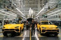 The assembly line of the new Urus, the first SUV made by Lamborgini, at the companyÕs factory in Sant'Agata Bolognese, Italy, on June 8, 2022. Ferrari and Lamborghini are now wrestling with how to design electric sports cars that inspire the same devotion as their costly internal combustion models. (Federico Borella/The New York Times)