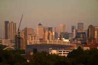 The skyscrapers of the financial district of Canary Wharf, at sunset in London, on Aug. 11.
