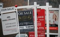 Real estate for sale signs are shown in Oakville, Ont. on December 1, 2018. Toronto Regional Real Estate Board says home sales were strong in the first half of March but then started to slow down because of the COVID-19 pandemic. Sales of 8,012 homes for the whole month was a 12.3 per cent climb from last year. THE CANADIAN PRESS/Richard Buchan