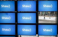 Shaw Communications Inc. says it earned $167 million in its latest quarter, down from a profit of $196 million in the same quarter last year. Shaw logos on display at the company's annual meeting in Calgary, Jan. 17, 2019. THE CANADIAN PRESS/Jeff McIntosh