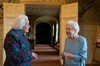 Britain's Queen Elizabeth meets Angela Wood, the women who helped created coronation chicken, during a reception in the Ballroom of Sandringham House, which is the Queen's Norfolk residence, in Sandringham, Britain, February 5, 2022. Joe Giddens/ Pool via REUTERS