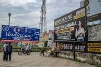 Billboards advertise study abroad programs that provide visas, in Jalandhar, India, in the northern state of Punjab, Sept. 23, 2023. IndiaÕs feud with Canada highlights how Prime Minister Narendra Modi has amplified a Sikh separatist threat that in reality is largely a diaspora illusion. (Atul Loke/The New York Times)