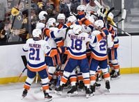 May 31, 2021; Boston, Massachusetts, USA; The New York Islanders celebrate after defeating the Boston Bruins in overtime in game two of the second round of the 2021 Stanley Cup Playoffs at TD Garden. Mandatory Credit: Bob DeChiara-USA TODAY Sports