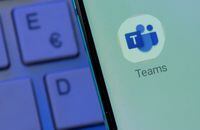 FILE PHOTO: Microsoft Teams app is seen on the smartphone placed on the keyboard in this illustration taken, July 26, 2021. REUTERS/Dado Ruvic/Illustration/File Photo