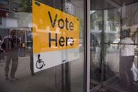 An Elections Ontario sign is seen at University - Rosedale voting location at the Toronto Reference Library on June 7, 2018. THE CANADIAN PRESS/Marta Iwanek