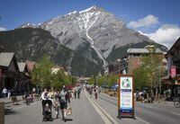 As COVID restrictions slowly lift, tourists roam the main street of Banff, Alberta, June 5, 2021. Alberta is currently is stage 1 of re-opening and has met stage 2 restrictions to re-open on June 10 as long as hospital cases continue to decline. Todd Korol/The Globe and Mail