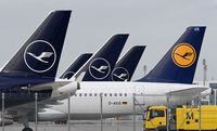 Airplanes of German airline Lufthansa are parked at the Franz-Josef-Strauss airport in Munich, southern Germany, during a strike of the ground staff employees of Lufthansa on July 27, 2022, - German national carrier Lufthansa said it would have to cancel almost all flights at its domestic hubs in Frankfurt and Munich on July 27, 2022 because of a planned strike by ground crew, adding to a summer of travel chaos across Europe. (Photo by Christof STACHE / AFP) (Photo by CHRISTOF STACHE/AFP via Getty Images)
