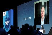 FILE PHOTO: SpaceX founder and Tesla CEO Elon Musk speaks on a screen during the Mobile World Congress (MWC) in Barcelona, Spain, June 29, 2021. REUTERS/Nacho Doce