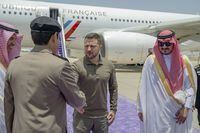 FILE - In this photo provided by Saudi Press Agency, SPA, Ukraine's President Volodymyr Zelenskyy, second right, is greeted by Prince Badr Bin Sultan, deputy governor of Mecca, right, upon his arrival at Jeddah airport, Saudi Arabia, Friday, May 19, 2023. Japan’s government officially announced Saturday that Zelenskyy is visiting Japan to join Group of Seven leaders in a session on Ukraine on Sunday. (Saudi Press Agency via AP, File)