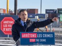 Federal Conservative Party leader Pierre Poilievre speaks about his car theft policy during a news conference at the Port of Montreal on Tuesday, February 6, 2024. THE CANADIAN PRESS/Ryan Remiorz