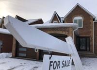 A house for sale sign is shown in front of a house in Oakville, Ont., west of Toronto, Sunday, Feb.5, 2023. The Canadian Real Estate Association says homes sales inJanuary were the lowest for the month since 2009 and fell 37.1 per cent compared with a year ago.THE CANADIAN PRESS/Richard Buchan