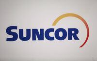 Suncor Energy Inc.'s logo is shown at the company's annual meeting in Calgary on April 27, 2017. THE CANADIAN PRESS/Jeff McIntosh