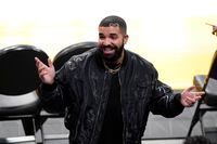 Rapper Drake gestures after watching an NBA basketball Western Conference Play-In game between the Los Angeles Lakers and the Golden State Warriors Wednesday, May 19, 2021, in Los Angeles. Drake has announced his new album "Certified Lover Boy" is headed to streaming services on Friday. THE CANADIAN PRESS/AP-Mark J. Terrill