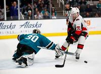 San Jose Sharks goaltender Aaron Dell (30) makes a save against the Ottawa Senators center Chris Tierney (71) on a penalty shot during the second period of an NHL hockey game in San Jose, Calif., Saturday, March 7, 2020. (AP Photo/Josie Lepe)