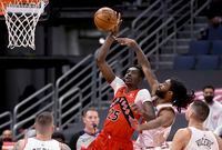 Toronto Raptors forward Chris Boucher (25) shoots against the Chicago Bulls during the second half of an NBA basketball game Thursday, April 8, 2021, in Tampa, Fla. (AP Photo/Jason Behnken)