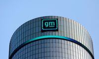 FILE PHOTO: The new GM logo is seen on the facade of the General Motors headquarters in Detroit, Michigan, U.S., March 16, 2021. REUTERS/Rebecca Cook/File Photo