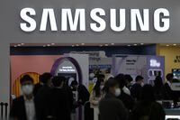 FILE - A logo of Samsung Electronics is seen at Korea Electronics Show in Seoul, South Korea, on Oct. 28, 2021. Samsung Electronics Co. on Thursday, July 28, 2022, reported it posted a 12% increase in operating profit for the second quarter of this year thanks to strong demand for server chips. (AP Photo/Lee Jin-man, File)