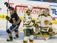 University of Lethbridge Pronghorns' Landon Gross, celebrates as a deflection gets past University of Alberta Golden Bears goaltender Zach Sawchenko as teammate Cole Linaker looks on during U CUP hockey action Thursday, March 14th, 2019, in Lethbridge, Alberta. THE CANADIAN PRESS/David Rossiter