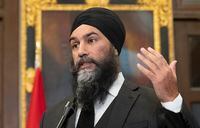 New Democratic Party leader Jagmeet Singh speaks with reporters before attending Question Period, Wednesday, October 19, 2022 in Ottawa.  THE CANADIAN PRESS/Adrian Wyld
