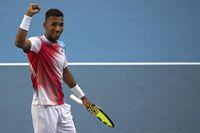 Felix Auger-Aliassime of Canada celebrates after defeating Marin Cilic of Croatia in their fourth round match at the Australian Open tennis championships in Melbourne, Australia, Monday, Jan. 24, 2022. (AP Photo/Simon Baker)