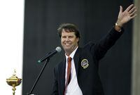 FILE - United States team captain Paul Azinger waves to spectators while speaking at the Ryder Cup opening ceremonies at the Valhalla Golf Club in Louisville, Ky., Sept. 18, 2008. Paul Azinger will no longer be the lead golf analyst for NBC Sports, ending his five years with the network at the Ryder Cup without even knowing that was his last event. (AP Photo/Chris O'Meara, File)