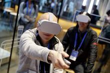 Attendees try the new Oculus Go goggles during F8, Facebook's developer conference in San Jose, Calif., Tuesday, May 1, 2018. The Oculus Quest headsets Meta created to access the metaverse aren't a fixture in most homes, businesses haven't shifted operations to the online space en masse and there's an abundance of questions about how safe the technology is and whether it's really needed at all. THE CANADIAN PRESS/AP-Marcio Jose Sanchez