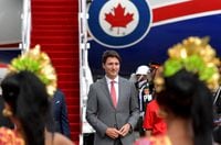 Canadian Prime Minister Justin Trudeau arrives at Ngurah Rai International Airport ahead of the G20 Summit in Bali, Indonesia November 14, 2022. Fikri Yusuf/G20 Media Center/Handout via REUTERS THIS IMAGE HAS BEEN SUPPLIED BY A THIRD PARTY. MANDATORY CREDIT.