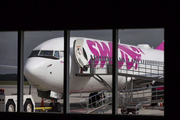 Swoop Airlines Boeing 737 on display on June 19, 2018 at John C. Munro International Airport in Hamilton, Ont. Hundreds of Swoop passengers are scrambling after the ultra-low-cost airline cancelled or delayed 23 flights over the past four days. THE CANADIAN PRESS/Tara Walton