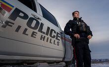 File Hills First Nation Police Service Cst. Nathan Roberts of the Carry the Kettle First Nation stands for a photograph near the Qu'Appelle Valley, Sask., on Friday, December 9, 2022.