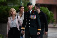 Maj.-Gen. Dany Fortin, right, arrives with his wife Madeleine Collin as he arrives at a Gatineau, Que. courthouse ahead of the second day of his trial on Tuesday, Sept. 20, 2022. THE CANADIAN PRESS/Spencer Colby