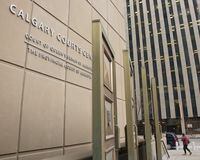 Alberta's top court has heard the appeal of a man found guilty of trying to extort a businessman of $1 million and killing a random stranger. The Calgary Courts Centre on Monday, March 11, 2019. THE CANADIAN PRESS/Jeff McIntosh