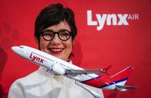 Merren McArthur, CEO of Lynx Air, announces the startup of the new airline at a news conference announcing Calgary, Alta., Tuesday, Nov. 16, 2021. THE CANADIAN PRESS/Jeff McIntosh