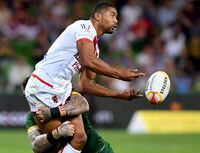 England's Kallum Watkins is tackled by Australia's Josh Dugan during their Rugby League World Cup game in Melbourne, Australia, Friday, Oct. 27, 2017. The Toronto Wolfpack are close to signing England international centre Watkins, needing only the approval of rugby league authorities to complete the deal. THE CANADIAN PRESS/AP/Andy Brownbill