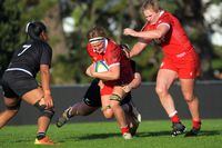 Canada's Tyson Beukeboom (centre) in action during the 2022 Pacific Four Women's Rugby Series rugby match between NZ Black Ferns and Canada at Trusts Stadium in Auckland, New Zealand on Sunday, June 12, 2022. Beukeboom celebrated her 50th cap with a try off the bench as Canada defeated Fiji 24-7 Friday in its final test match ahead of next month’s Women’s Rugby World Cup. THE CANADIAN PRESS/HO-Rugby Canada-Dave Lintott **MANDATORY CREDIT** 