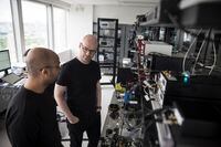 ***please use no smaller than three columns ***. Christian Weedbrook, founder of the quantum technologies company, Xanadu, listens in as Varun Vaidya, left, demonstrates the working principle of one of the building blocks of quantum computers, at their office in Toronto on Thursday, June 20, 2019.  Tijana Martin/ The Globe and Mail