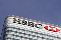 FILE PHOTO: The HSBC bank logo is seen in the Canary Wharf financial district in London, Britain, March 3, 2016.  REUTERS/Reinhard Krause/File Photo