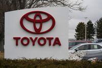 FILE - The company logo adorns a sign outside a Toyota dealership Sunday, March 21, 2021, in Lakewood, Colo. North Carolina officials have scheduled a Monday, Dec. 6, 2021, news conference to announce a major economic development project, which likely will be construction of a Toyota electric vehicle battery factory with 1,750 workers. Officials from the state and an unidentified company will attend. (AP Photo/David Zalubowski, File)