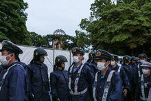 HIROSHIMA, JAPAN - MAY 18: Police officers are seen near the Atomic Bomb Dome on May 18, 2023 in Hiroshima, Japan. The G7 summit will be held in Hiroshima from 19-22 May. (Photo by Takashi Aoyama/Getty Images)